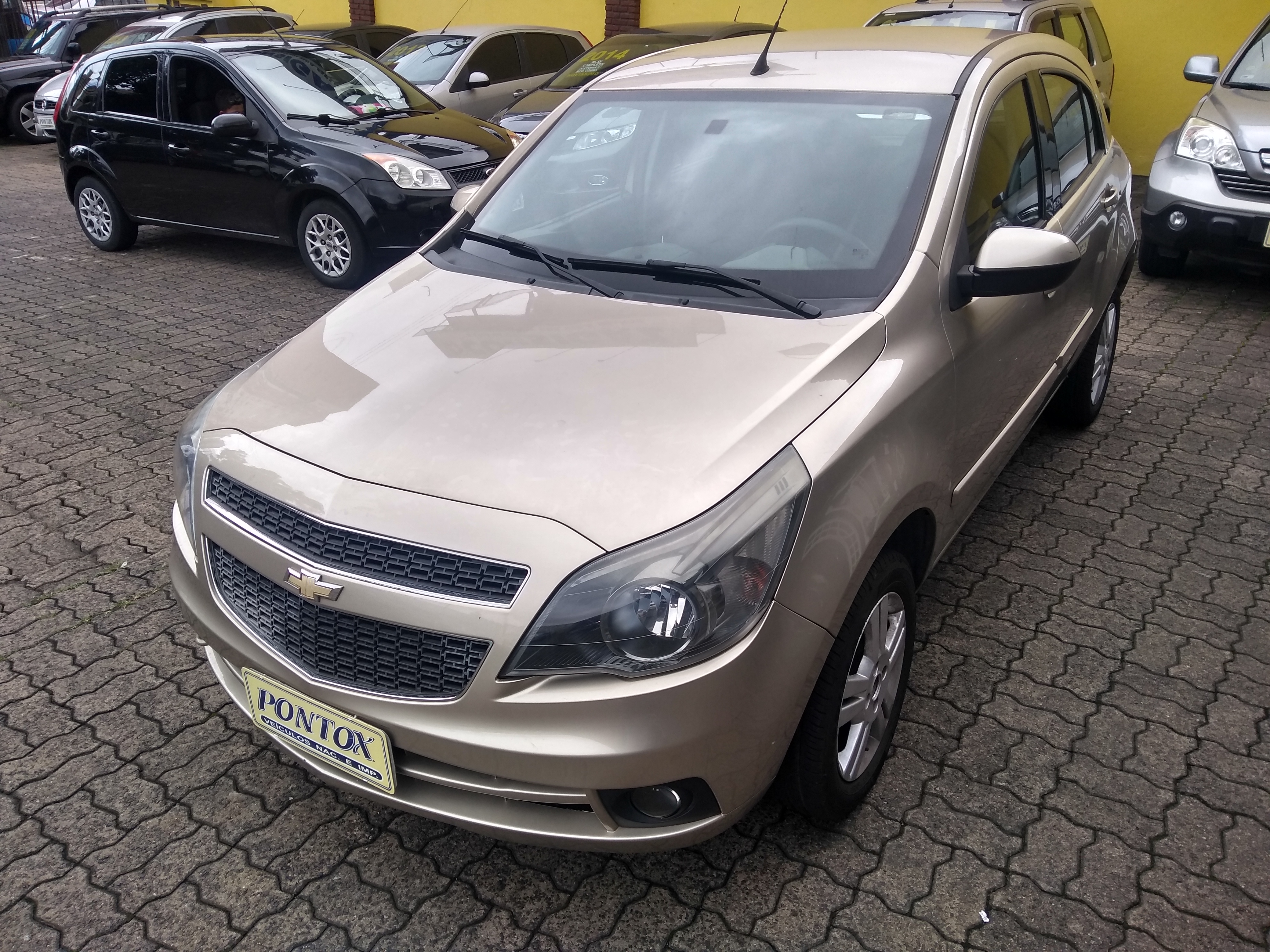 AGILE 1.4 LTZ 2013/2013 ,EXCELENTE ESTADO ,COM AR DIREÇÃO VIDROS , PNEUS NOVOS , E PEGAR E ANDAR