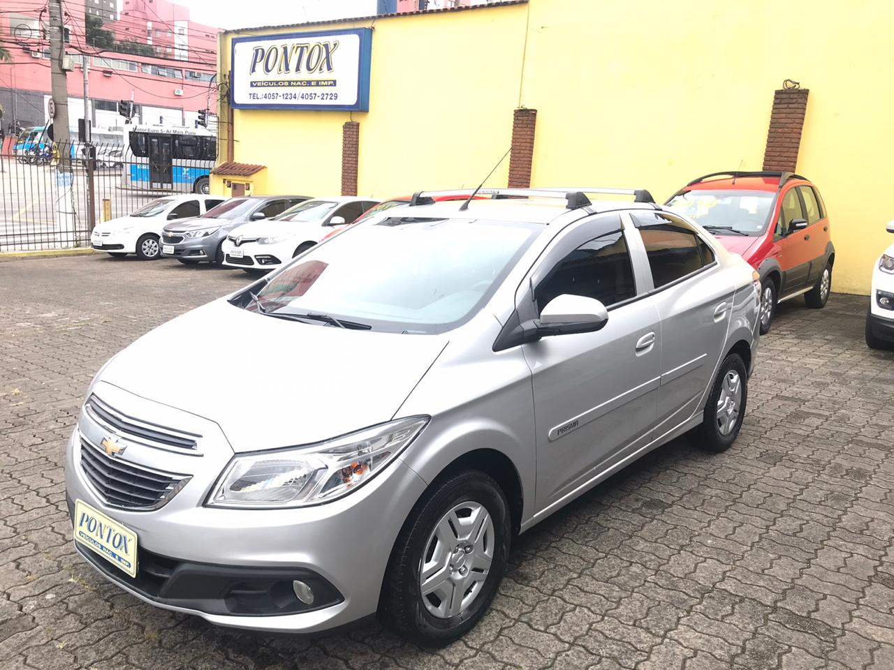 PRISMA 1.0 LT ,2015 , COM BAIXA KM , AR DIREÇÃO VIDROS ,TODO ORIGINAL , E PEGAR E ANDAR